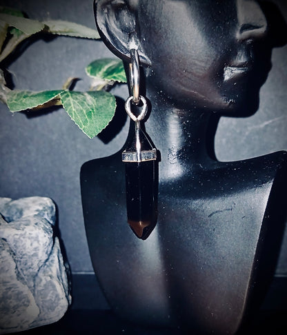 Black crystal earrings: protection, grounding, and elegance